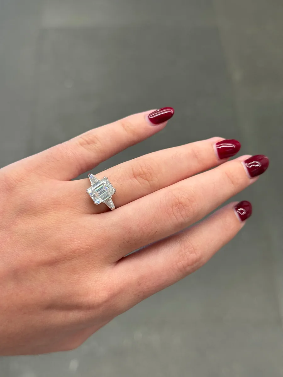 3ct Emerald Cut Trilogy Ring worn