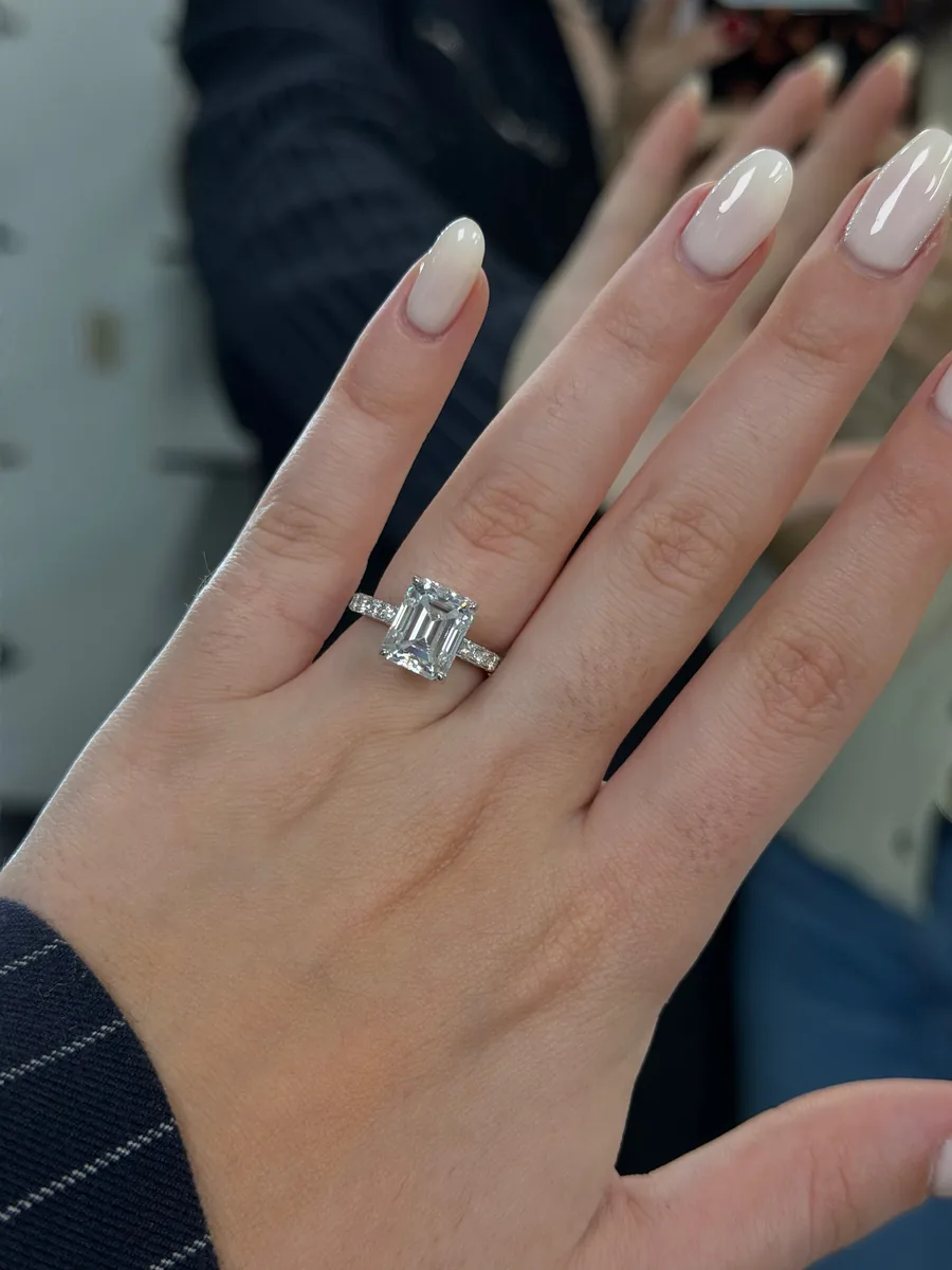 4ct emerald cut ring worn