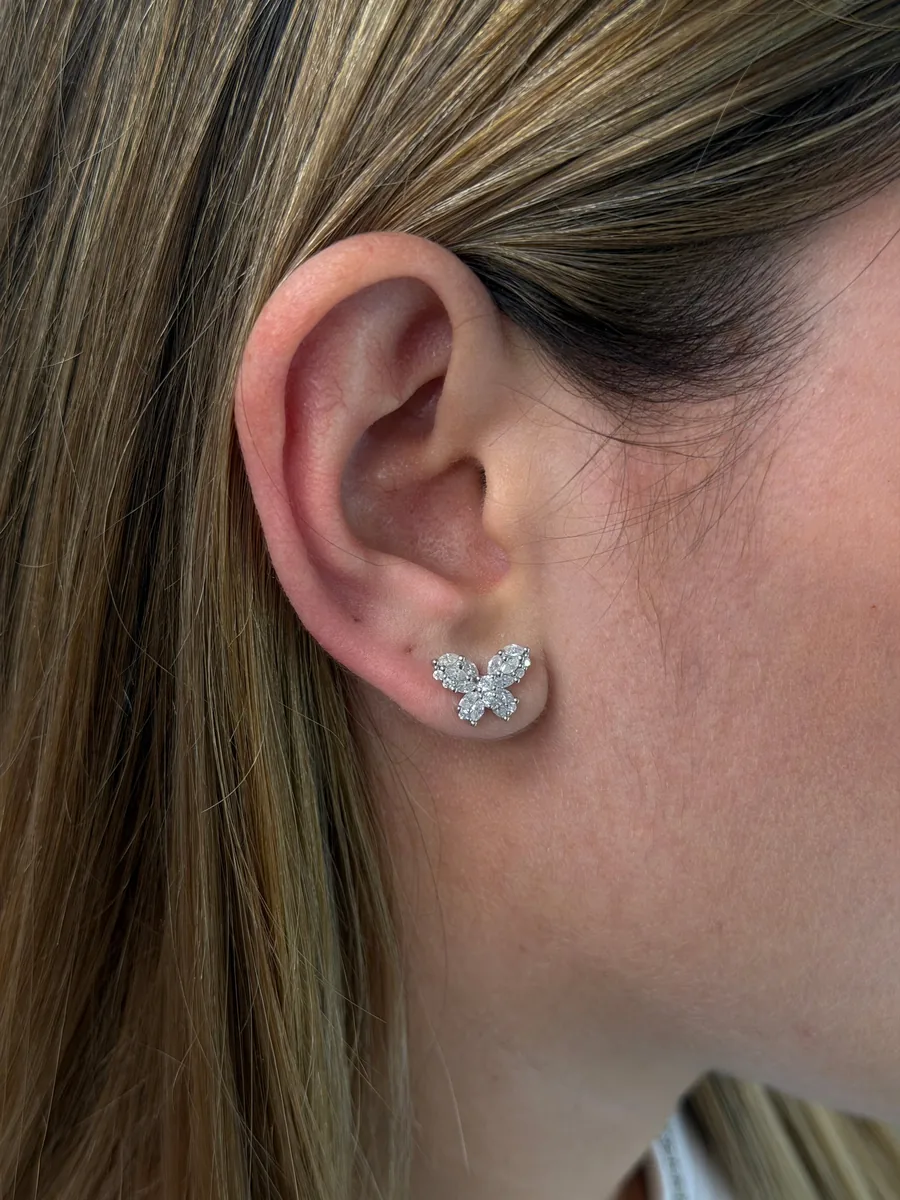 Butterfly earrings worn
