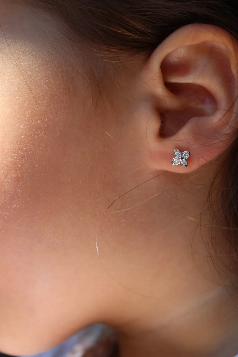 Mini Clover Sparkle Studs - Little Gems Collection worn