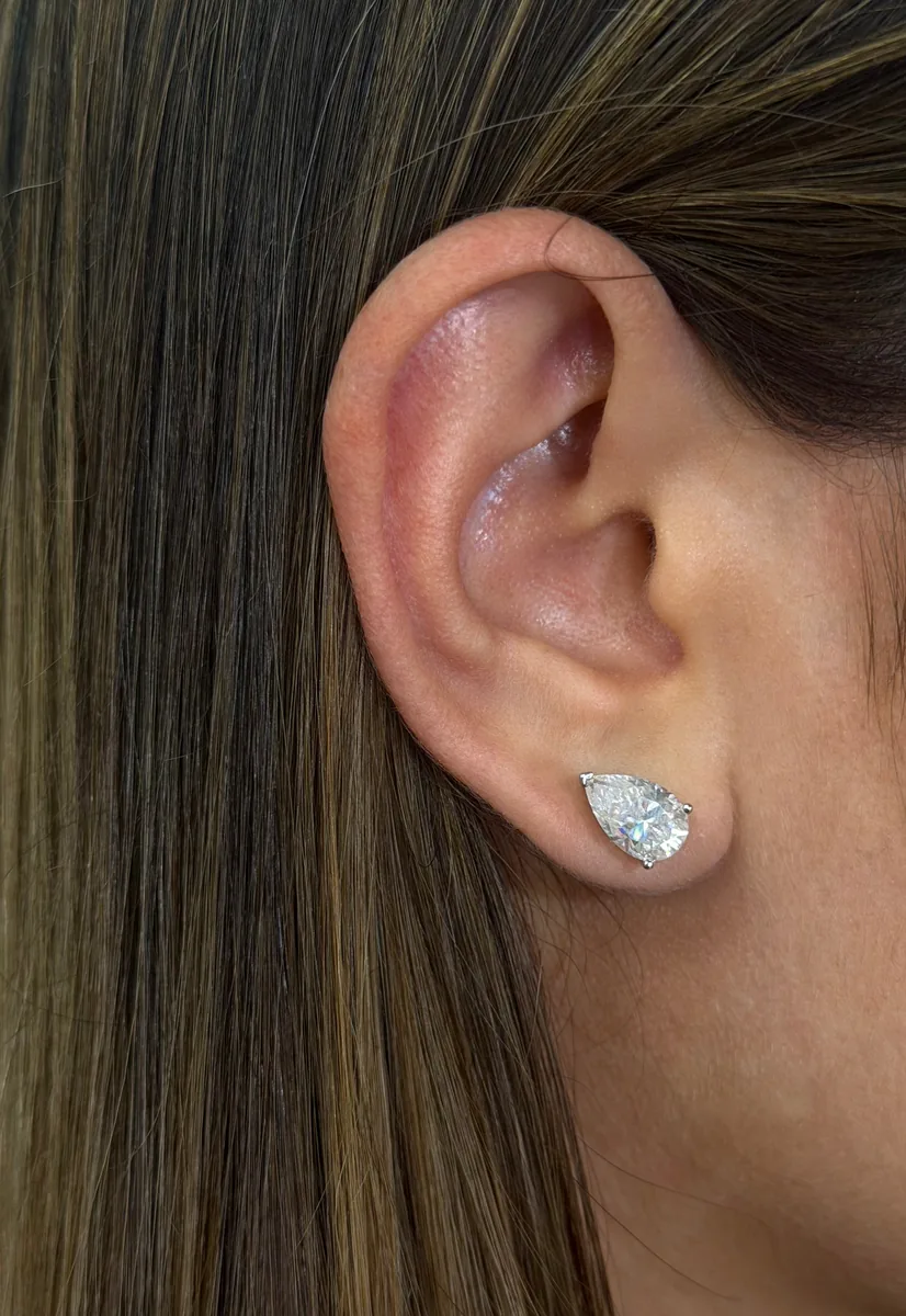 Pear Cut Solitaire Stud Earrings worn
