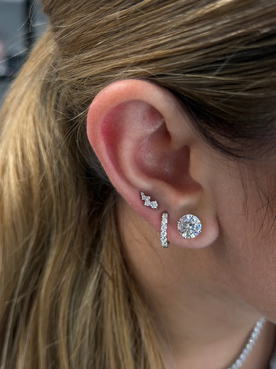 Petite spark stud earrings worn